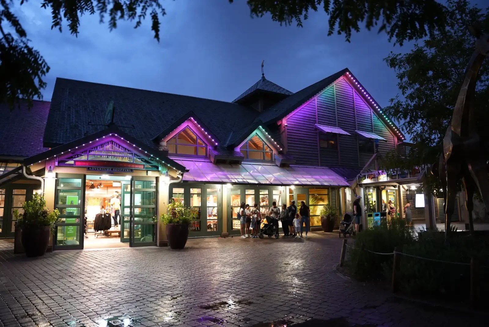 Colorful commercial exterior lighting at a restaurant courtyard